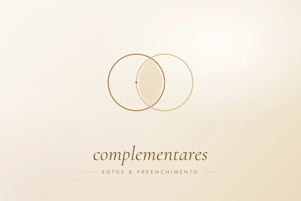 Ilustração em traço dourado de dois círculos que se encontram, com a palavra complementares